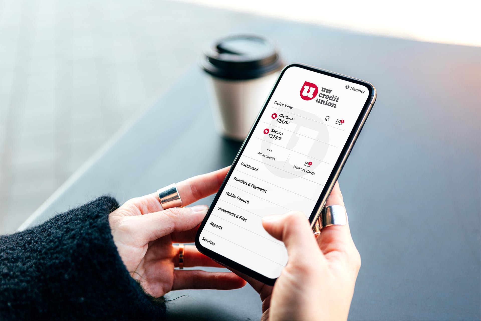 Member using the UW Credit Union Mobile App