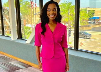 Jada Davis, 2022 Miss Milwaukee, poses for a photo at a Milwaukee convention center.